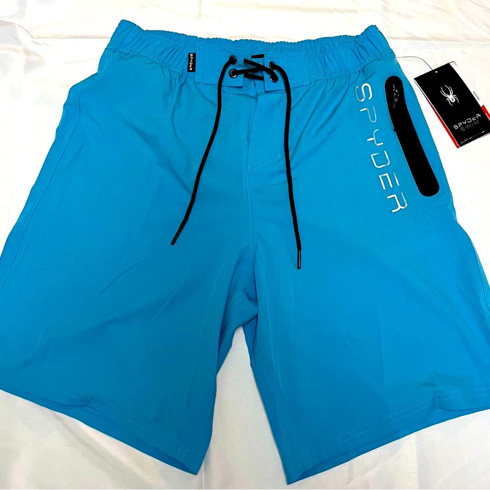 Spyder Swim Trunks. New with tags. Blue with Black mesh inner. Mens Large.
